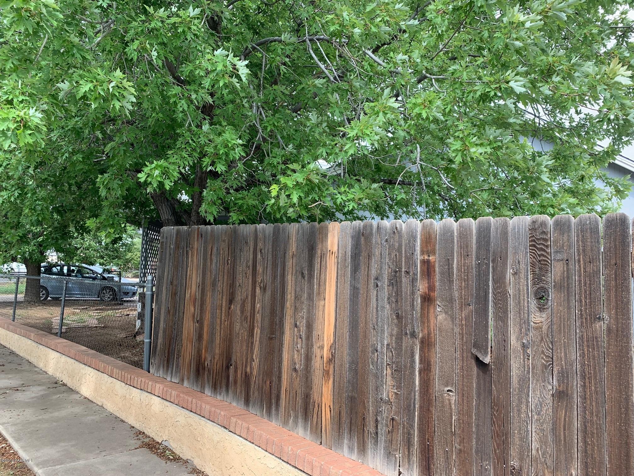 3325 North Robert Road Prescott Valley, AZ 86314 - Photo 4 of 16 fence on outside