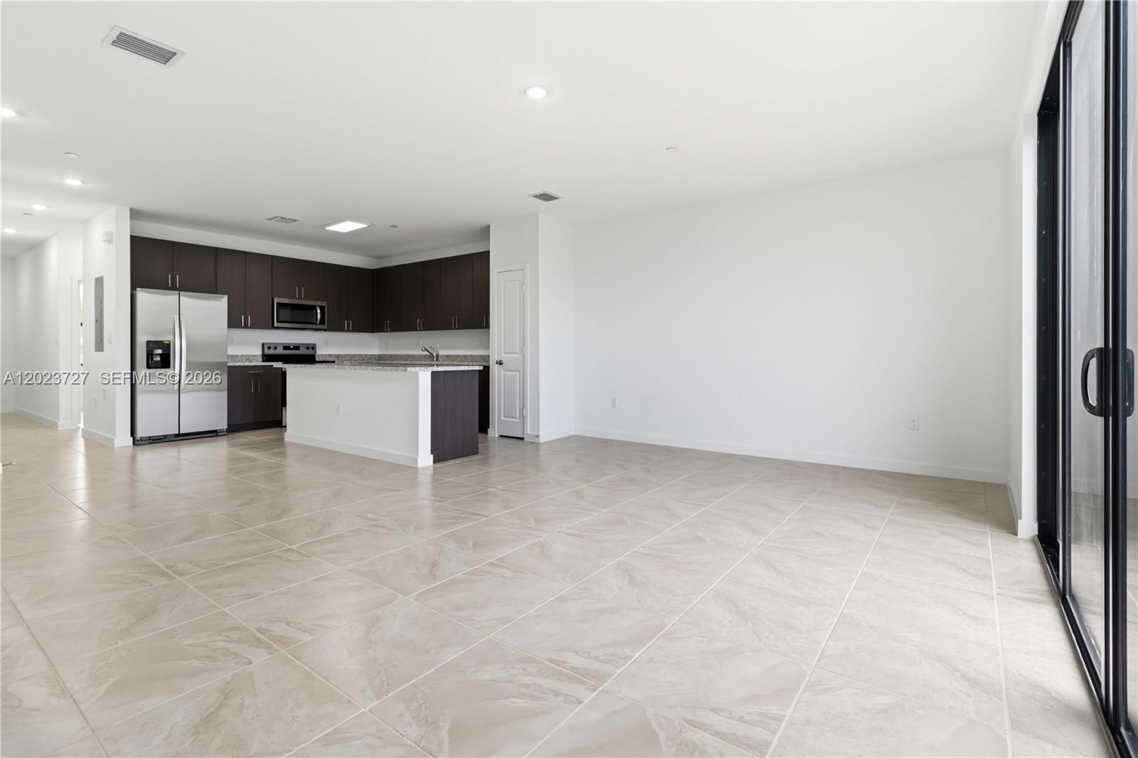 22348 Southwest 115th Court, Unit 22348 Miami, FL 33170 - Photo 4 of 37 a view of a kitchen with a sink