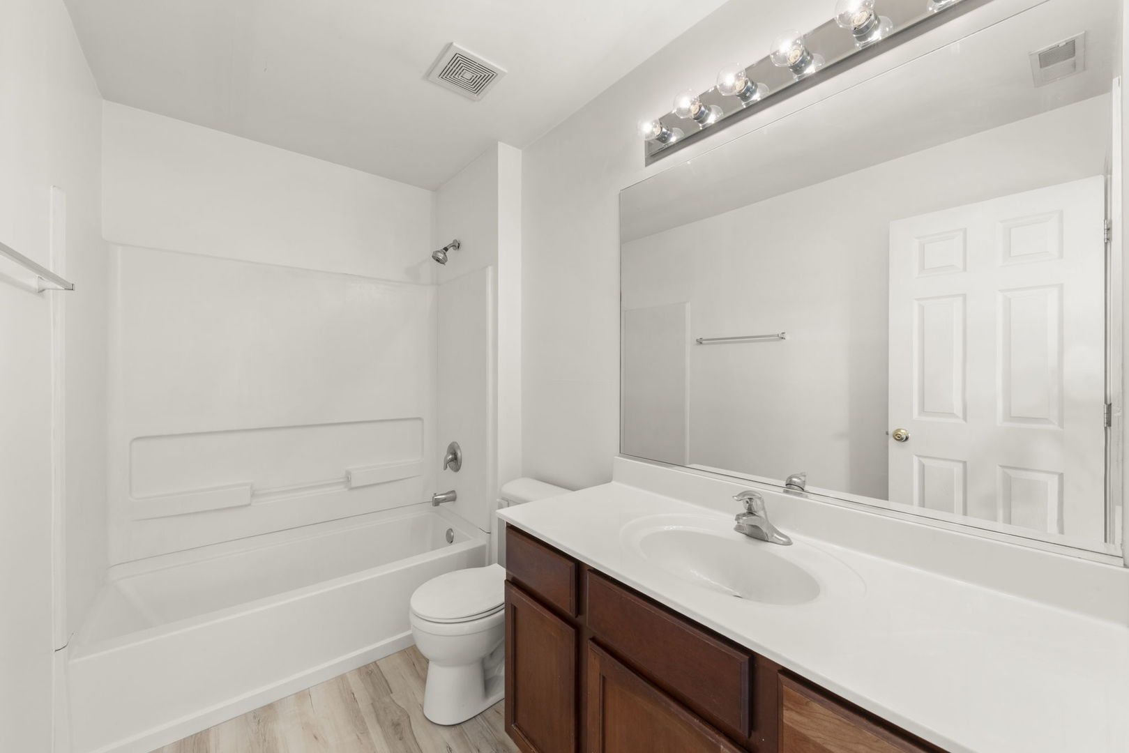 274 South Oak Creek Lane Romeoville, IL 60446 - Photo 16 of 19 a bathroom with a sink a toilet and shower