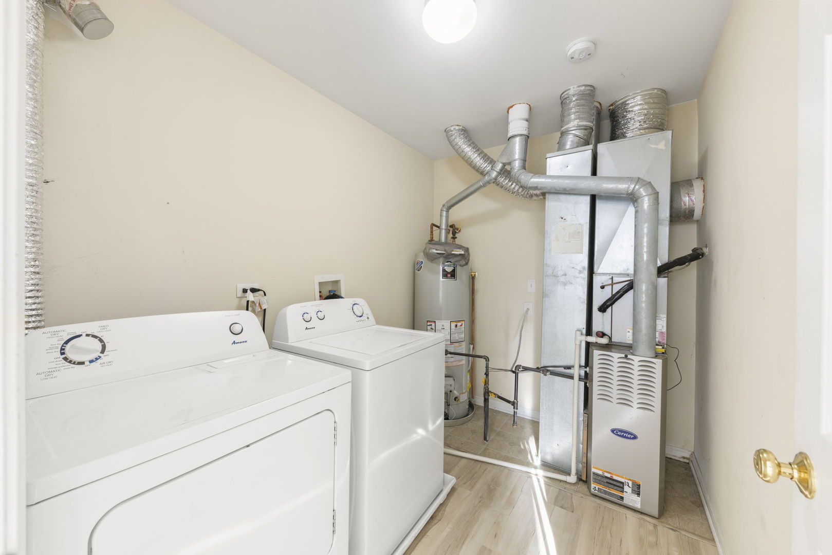 274 South Oak Creek Lane Romeoville, IL 60446 - Photo 17 of 19 a utility room with dryer and washer