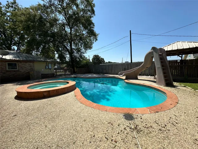 a view of a back yard of the house