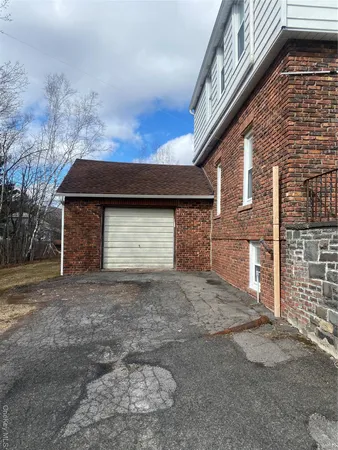 a front view of a house with a garage