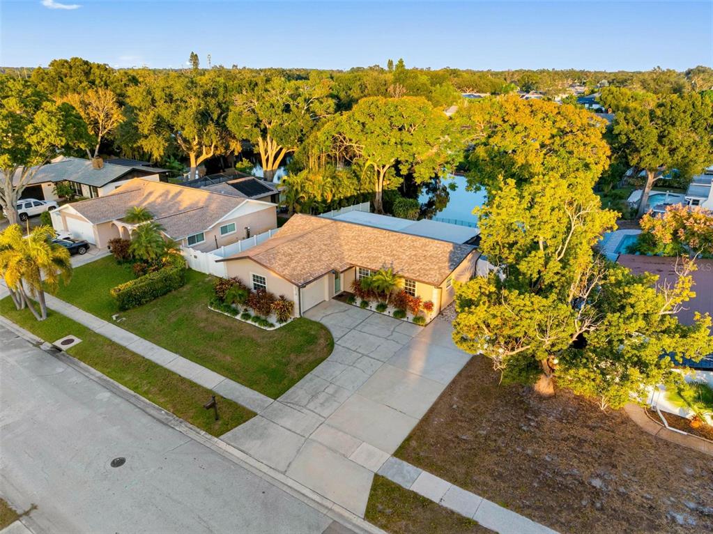 8139 129th Lane Seminole, FL 33776 - Photo 2 of 48 an aerial view of a house with a yard