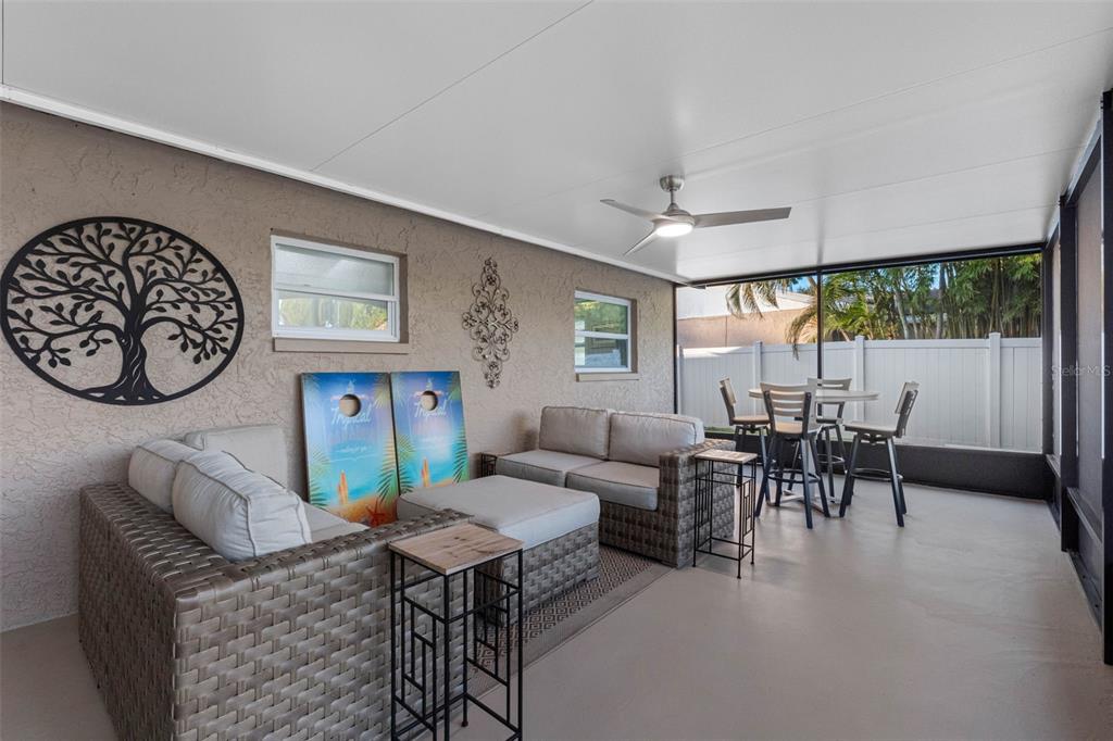 8139 129th Lane Seminole, FL 33776 - Photo 27 of 48 a living room with furniture and a large window