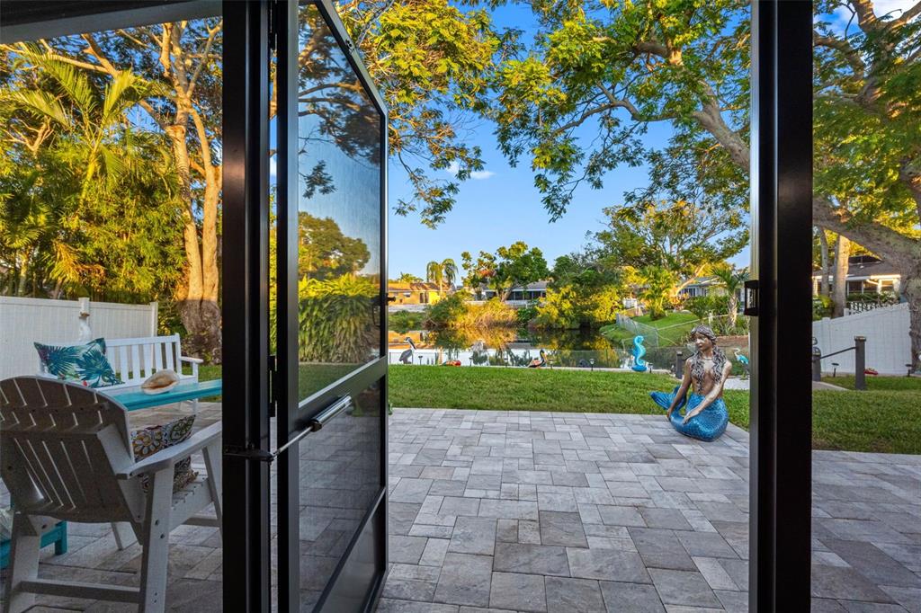 8139 129th Lane Seminole, FL 33776 - Photo 28 of 48 a view of a porch and garden