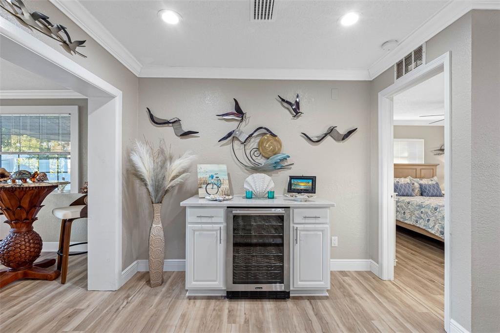8139 129th Lane Seminole, FL 33776 - Photo 3 of 48 a view of kitchen with cabinets and wooden floor