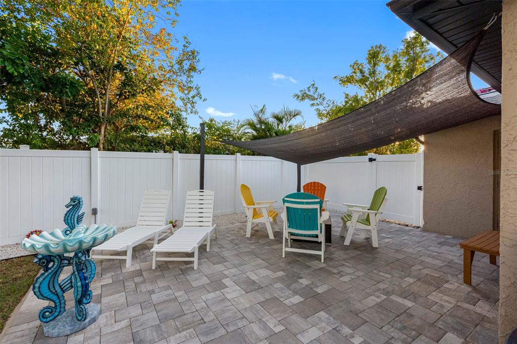 8139 129th Lane Seminole, FL 33776 - Photo 35 of 48 a view of a chairs and table in patio