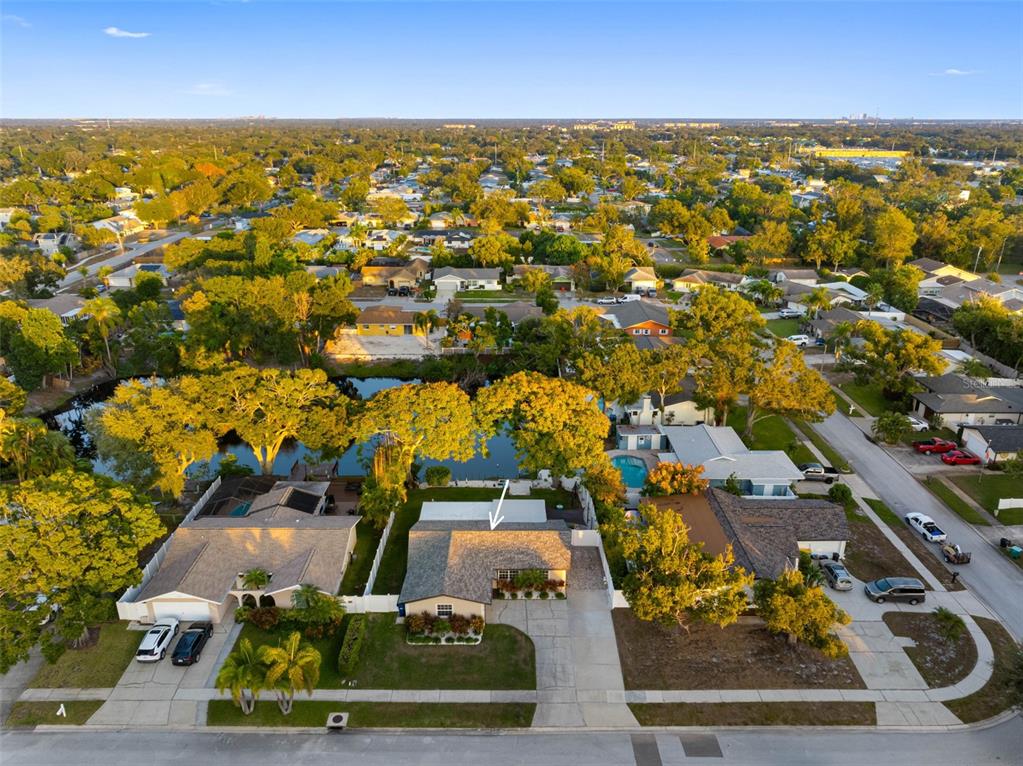 8139 129th Lane Seminole, FL 33776 - Photo 45 of 48 an aerial view of residential houses with outdoor space