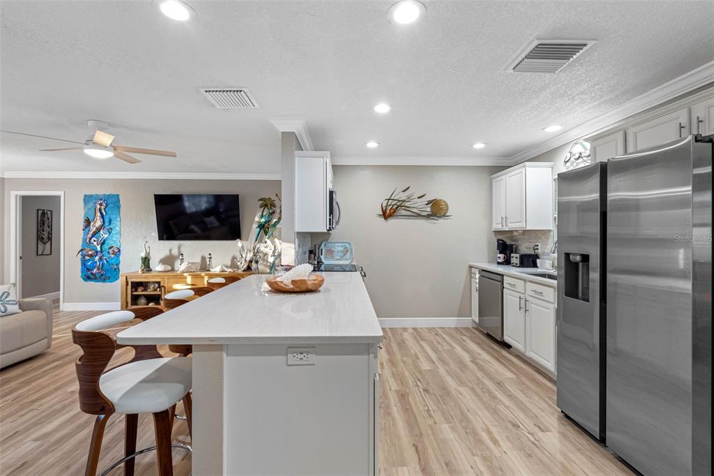 8139 129th Lane Seminole, FL 33776 - Photo 7 of 48 a kitchen with a sink appliances and cabinets