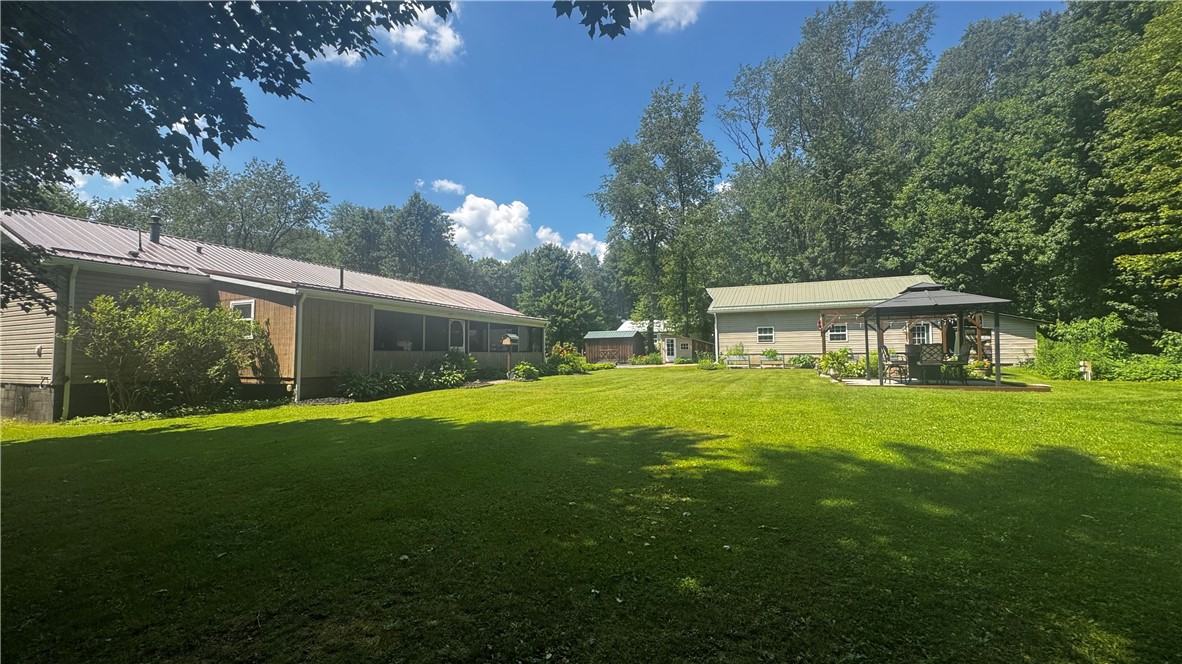 87 Collins Road Lewis Run, PA 16738 - Photo 32 of 48 Back of home with garage and entertainment space