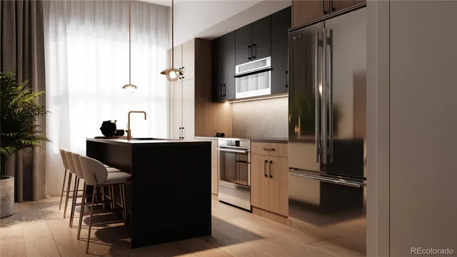 a kitchen with a sink appliances and cabinets