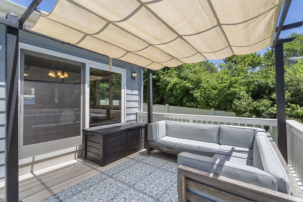 26 Miller Road Easton, MA 02356 - Photo 24 of 29 a roof deck with couch and chairs