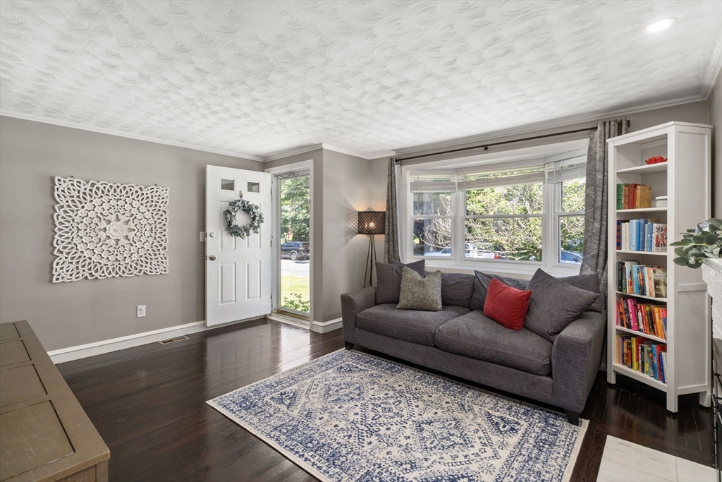 26 Miller Road Easton, MA 02356 - Photo 4 of 29 a living room with furniture and a rug