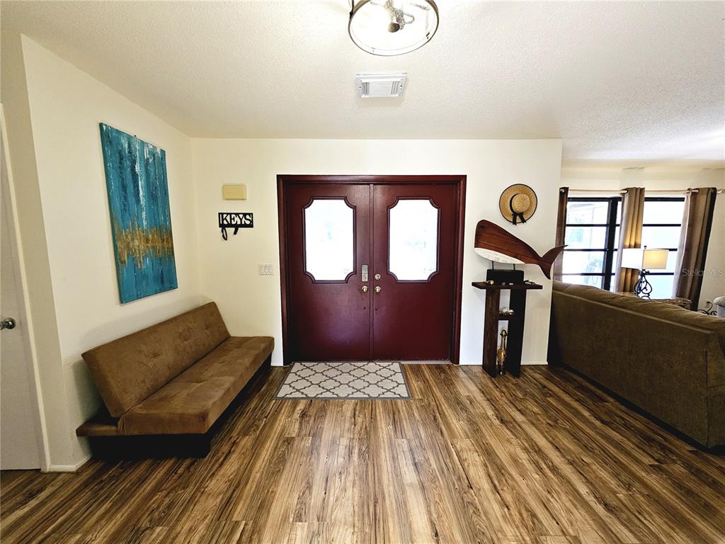 2411 Belle Road Englewood, FL 34223 - Photo 3 of 30 a living room with furniture