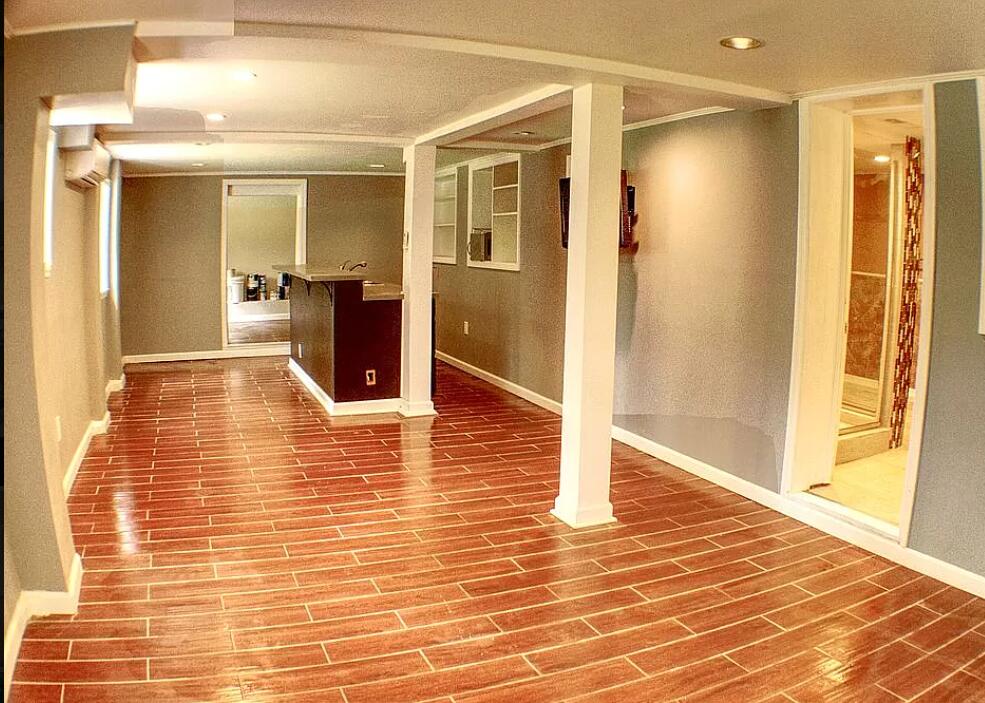 2005 Robin Road North Augusta, SC 29841 - Photo 29 of 36 a view of a hallway with wooden floor and a bathroom