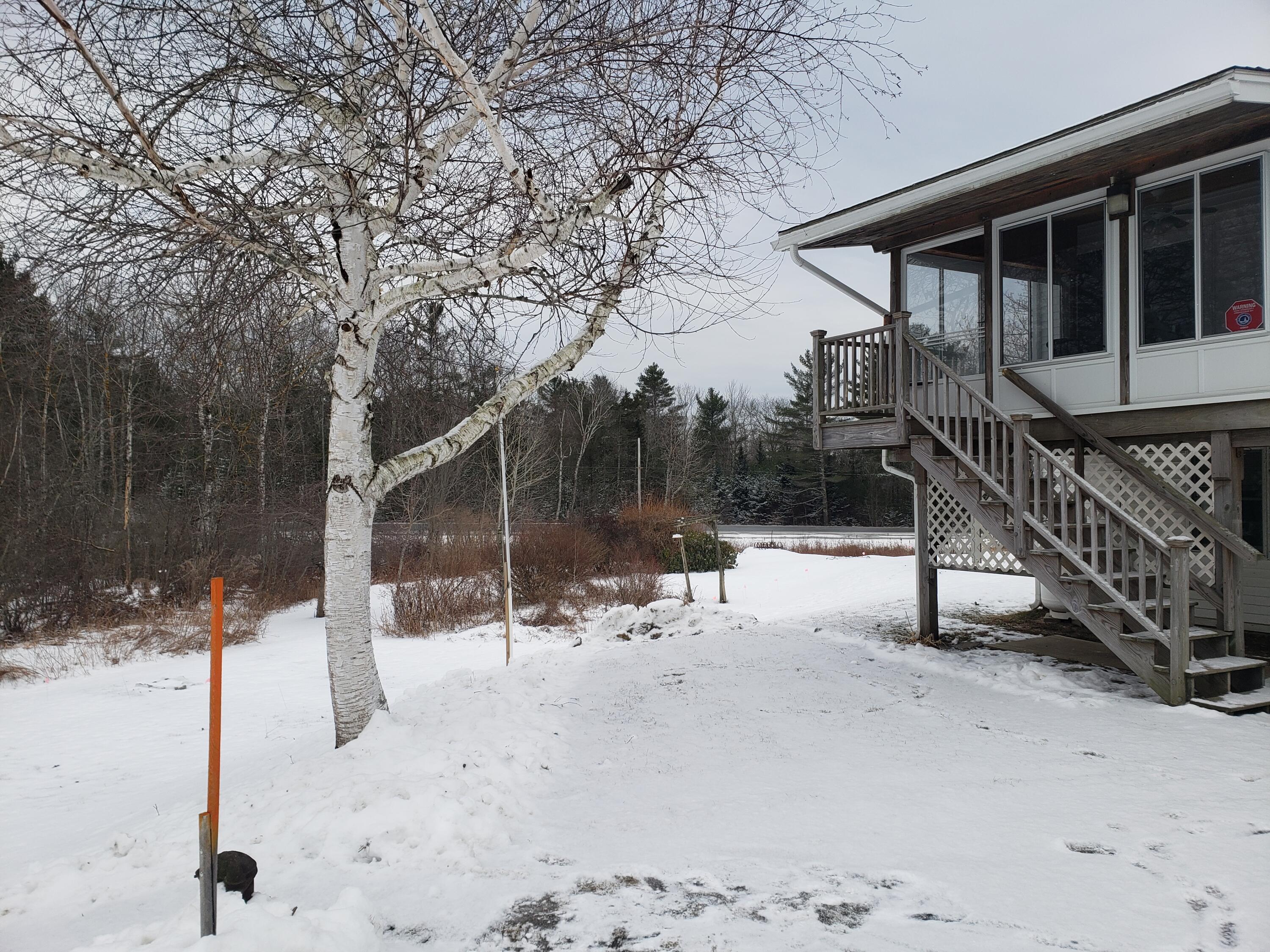 29 Duck Cove Road Orland, ME 04472 - Photo 21 of 60 Stairway off enclosed porch
