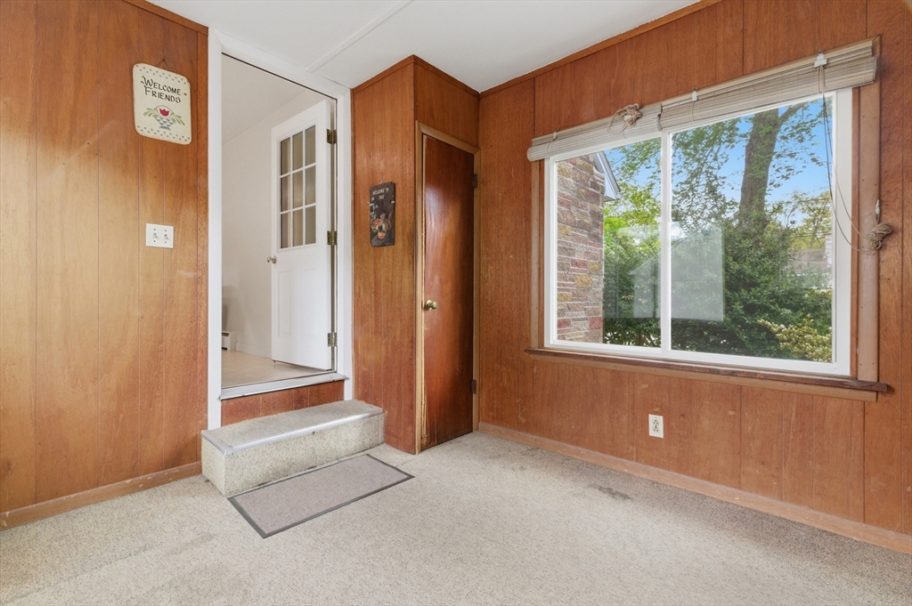 188 Glendale Road Attleboro, MA 02703 - Photo 10 of 37 a view of an empty room with a window