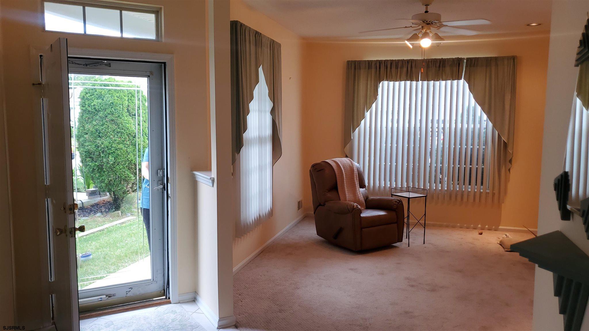 6 Quail Road Barnegat, NJ 08005 - Photo 4 of 9 a living room with furniture and a window
