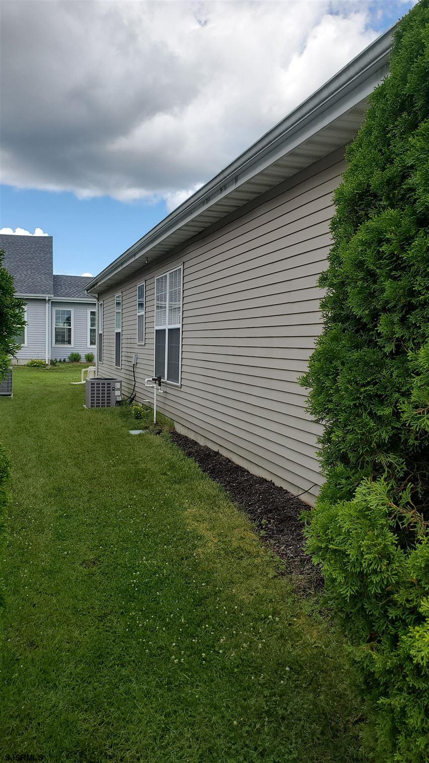 6 Quail Road Barnegat, NJ 08005 - Photo 7 of 9 a backyard of a house with lots of green space