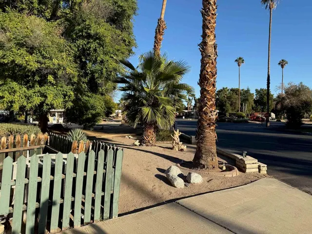 a view of balcony with wooden floor