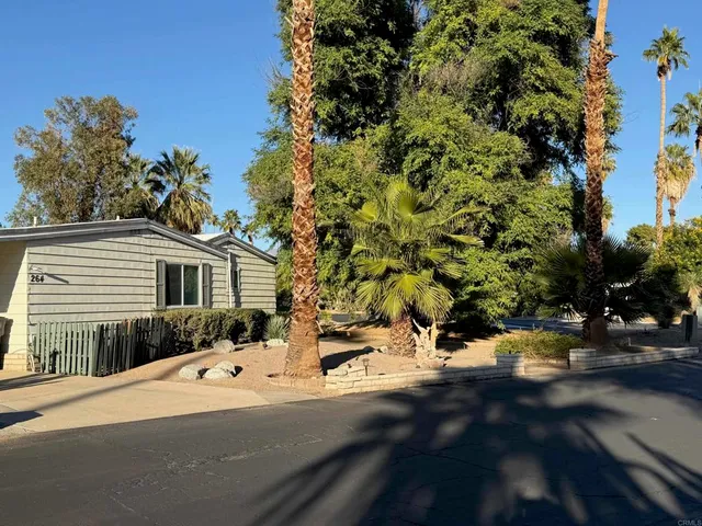 a view of backyard of a house