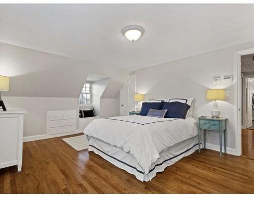 19 Woodridge Road Wellesley, MA 02482 - Photo 18 of 34 a bedroom with a bed and window