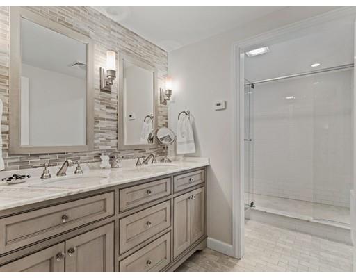 19 Woodridge Road Wellesley, MA 02482 - Photo 20 of 34 a bathroom with a sink and a mirror