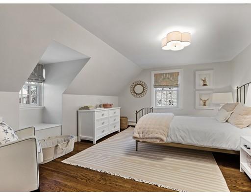 19 Woodridge Road Wellesley, MA 02482 - Photo 22 of 34 a bedroom with a bed and a night stand