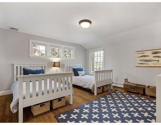 19 Woodridge Road Wellesley, MA 02482 - Photo 24 of 34 a bedroom with furniture and a window
