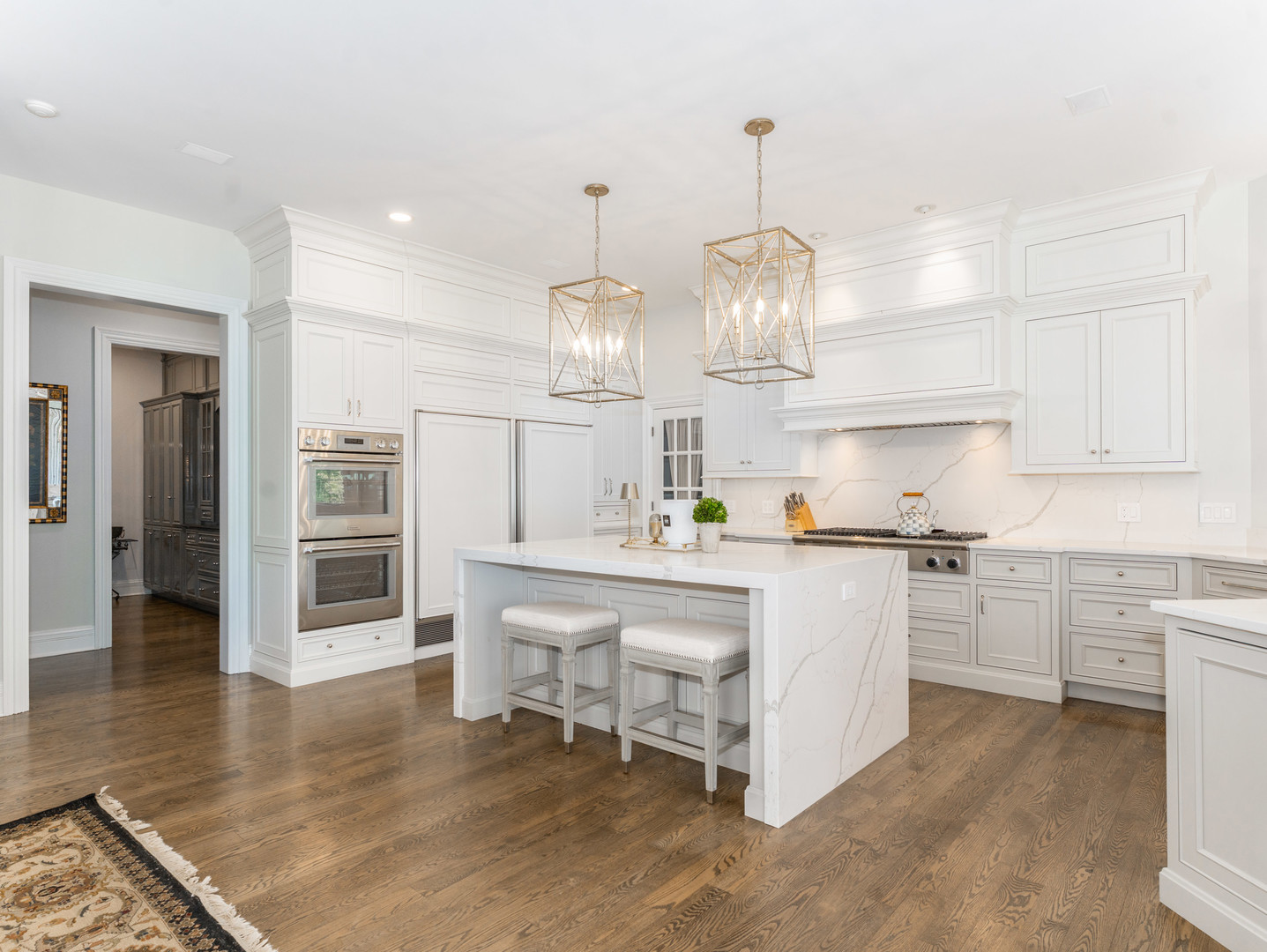 4N881 Old Farm Road St. Charles, IL 60175 - Photo 12 of 66 a kitchen with kitchen island granite countertop a sink cabinets and stainless steel appliances