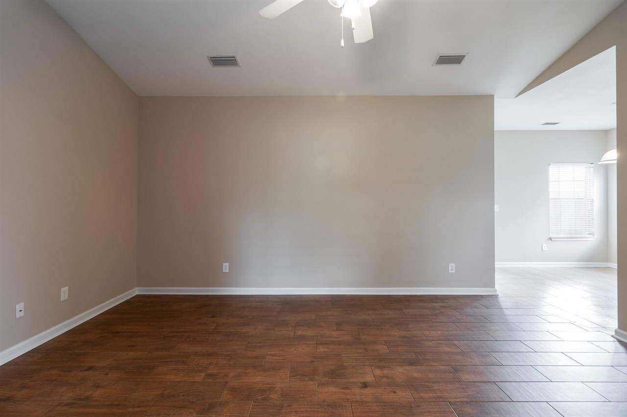 6883 Crimson Ridge Street Gulf Shores, AL 36542 - Photo 6 of 23 Living Room/ Dining Room