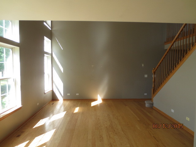 10549 Wakefield Lane Huntley, IL 60142 - Photo 6 of 19 a view of an empty room and window