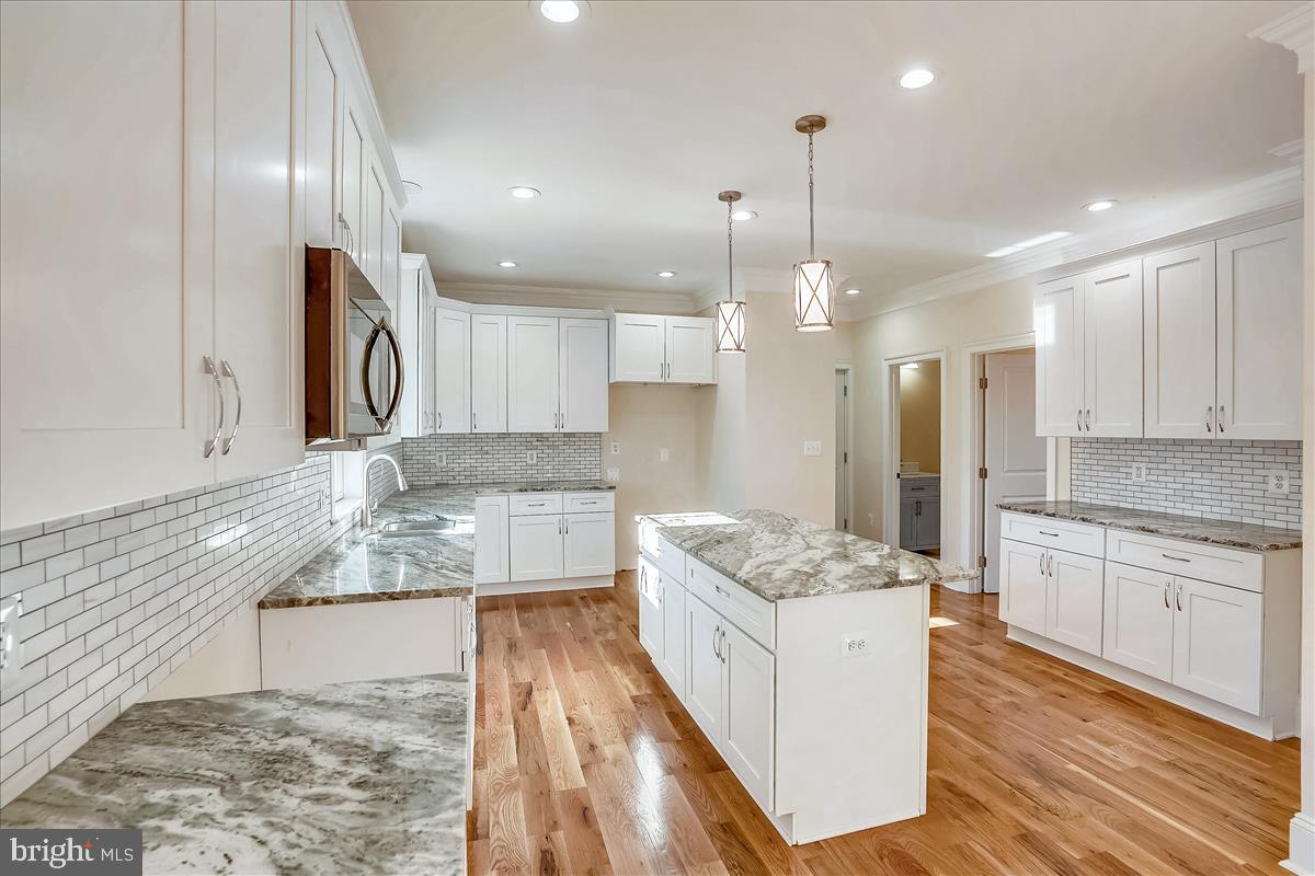5194 Leeds Manor Road Hume, VA 22639 - Photo 11 of 50 White shaker style cabinetry with granite counters
