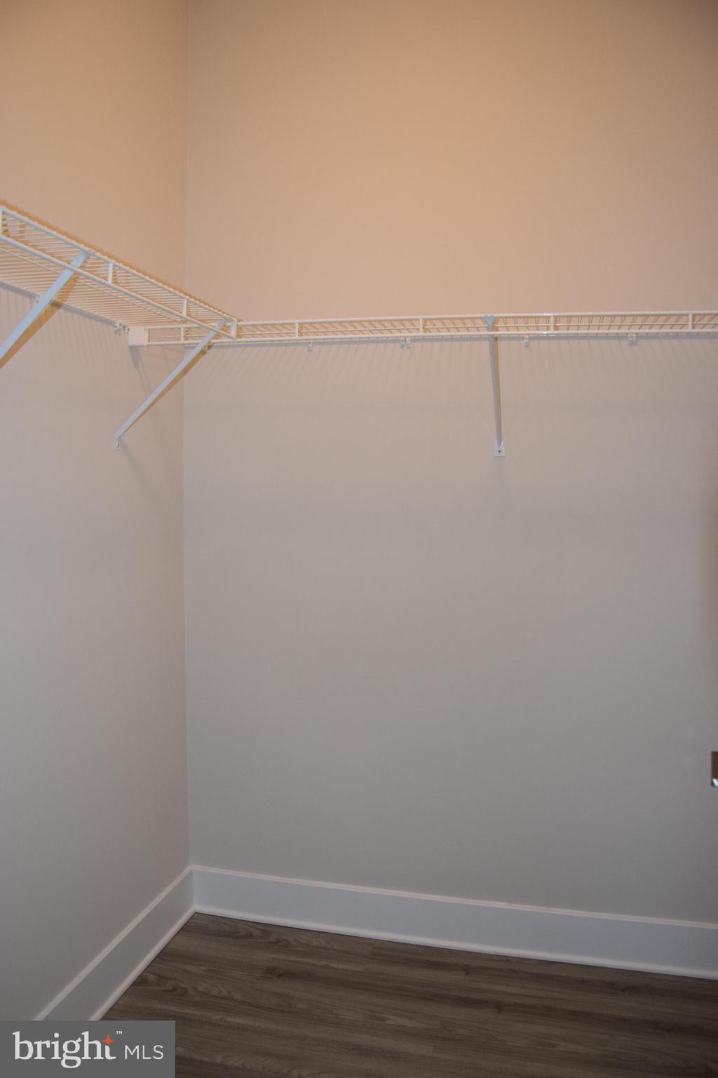 2915 Osprey Way Frederick, MD 21701 - Photo 11 of 27 a view of a room with racks on the wall