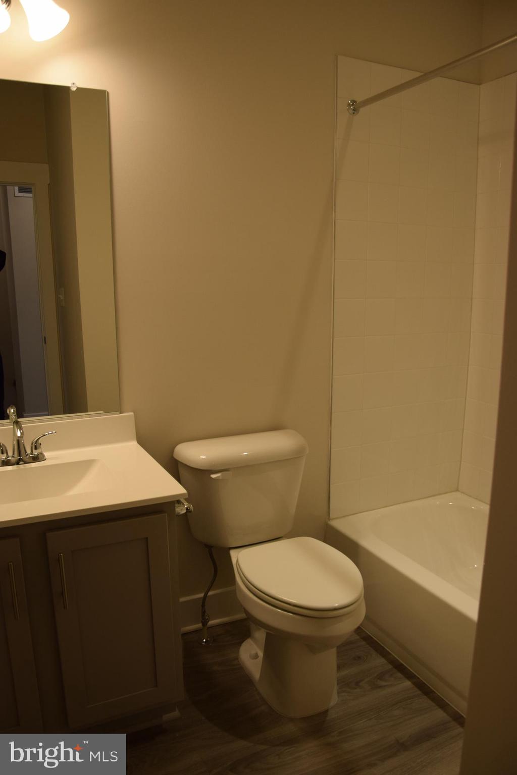 2915 Osprey Way Frederick, MD 21701 - Photo 14 of 27 a bathroom with a toilet a sink and shower