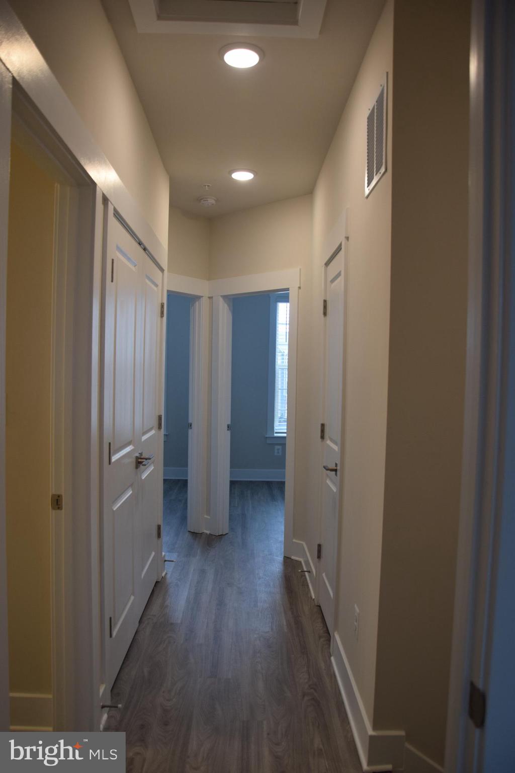 2915 Osprey Way Frederick, MD 21701 - Photo 15 of 27 a view of a hallway with wooden floor