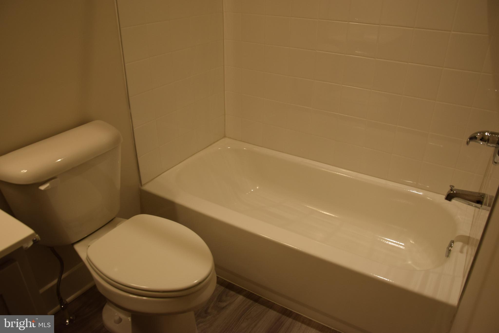 2915 Osprey Way Frederick, MD 21701 - Photo 16 of 27 a bathroom with a toilet and a sink