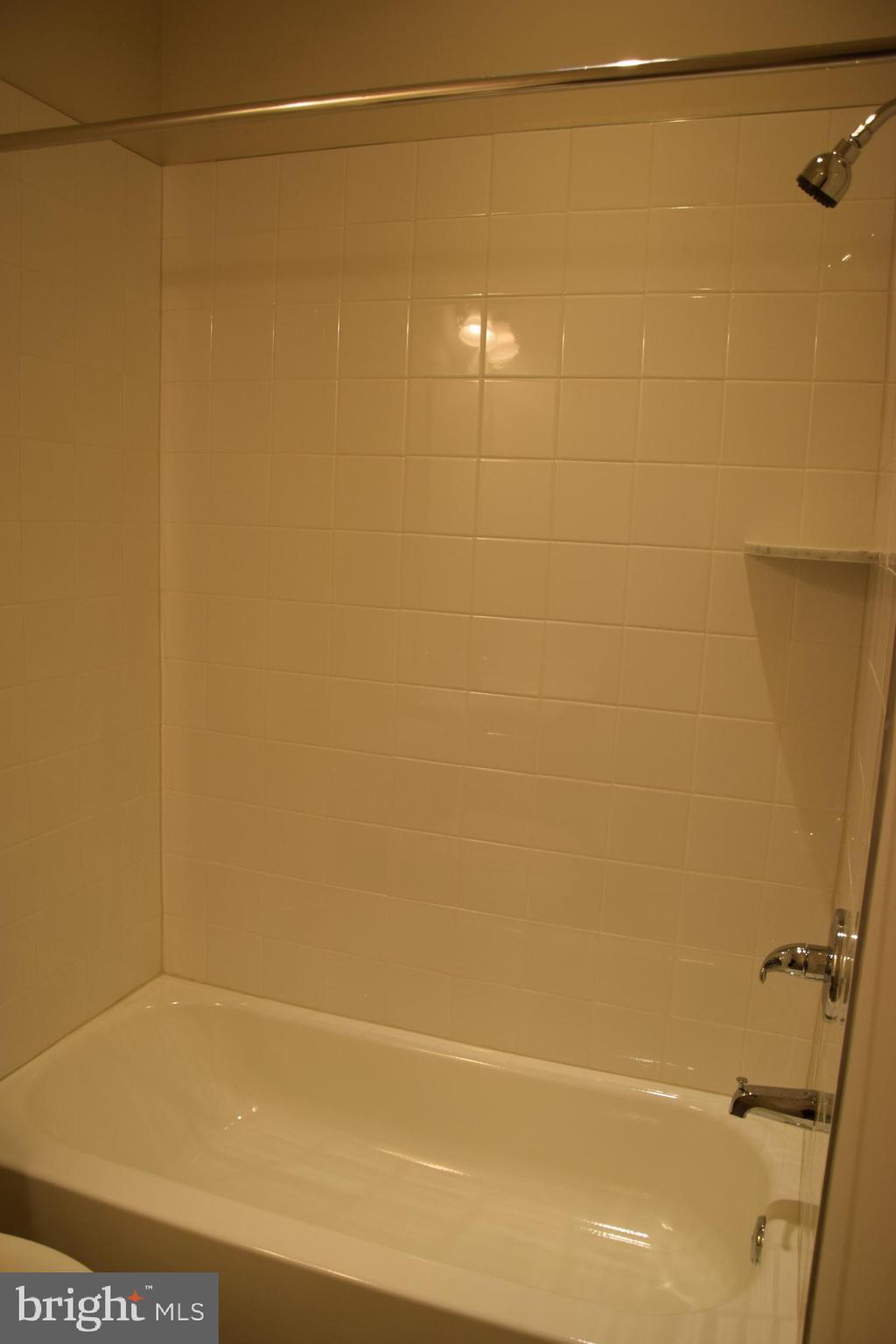 2915 Osprey Way Frederick, MD 21701 - Photo 17 of 27 a bathroom with a shower