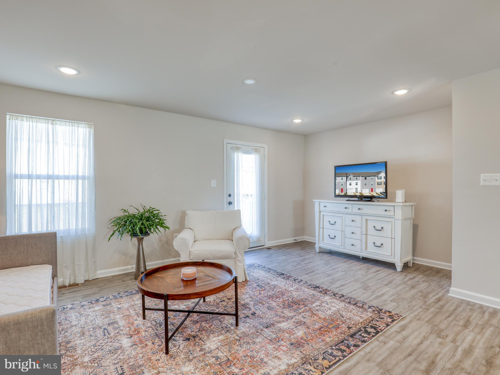58 Thrower Road Hedgesville, WV 25427 - Photo 14 of 42 a living room with furniture and a rug