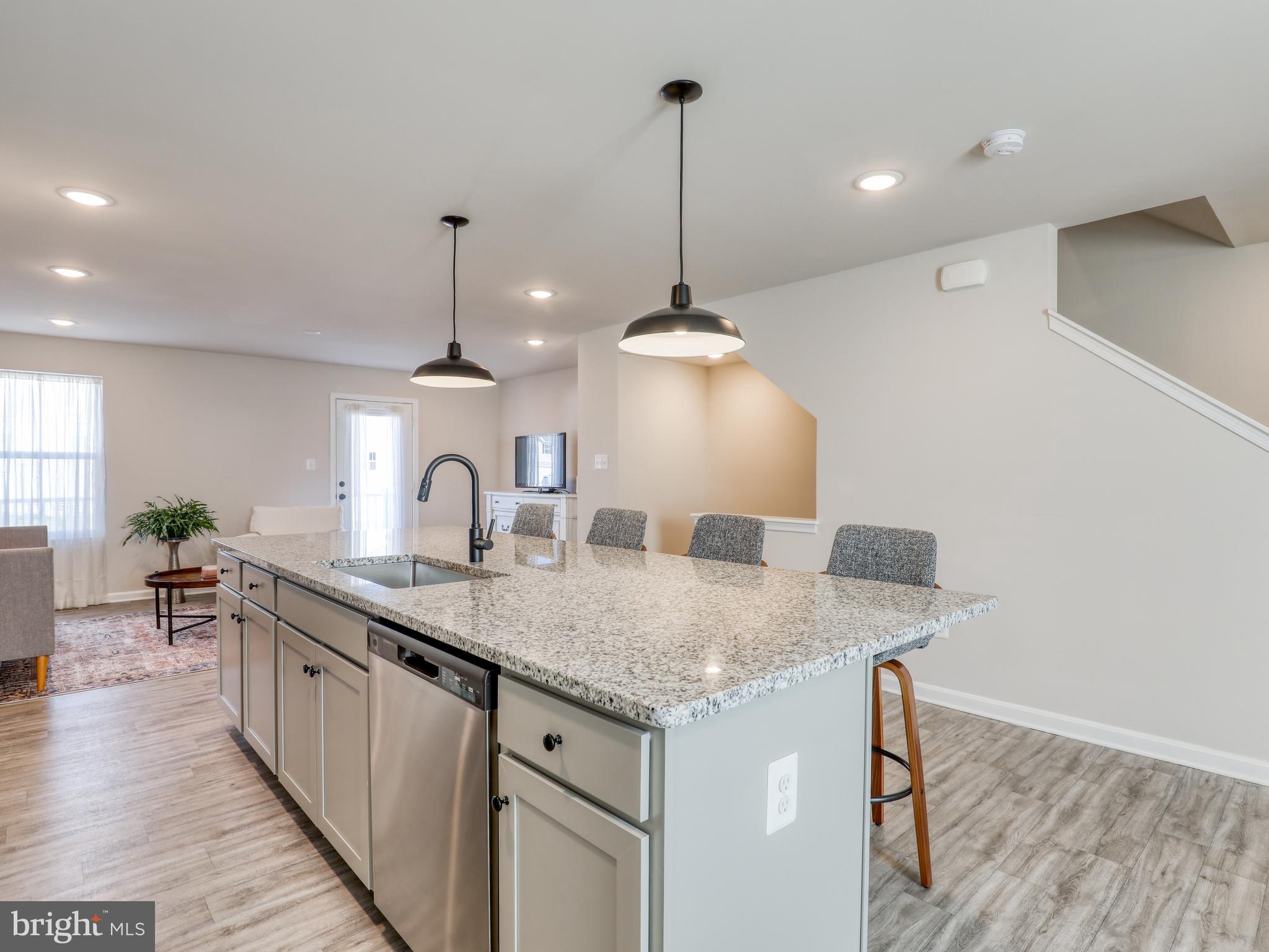 58 Thrower Road Hedgesville, WV 25427 - Photo 20 of 42 a kitchen with center island with wooden floor