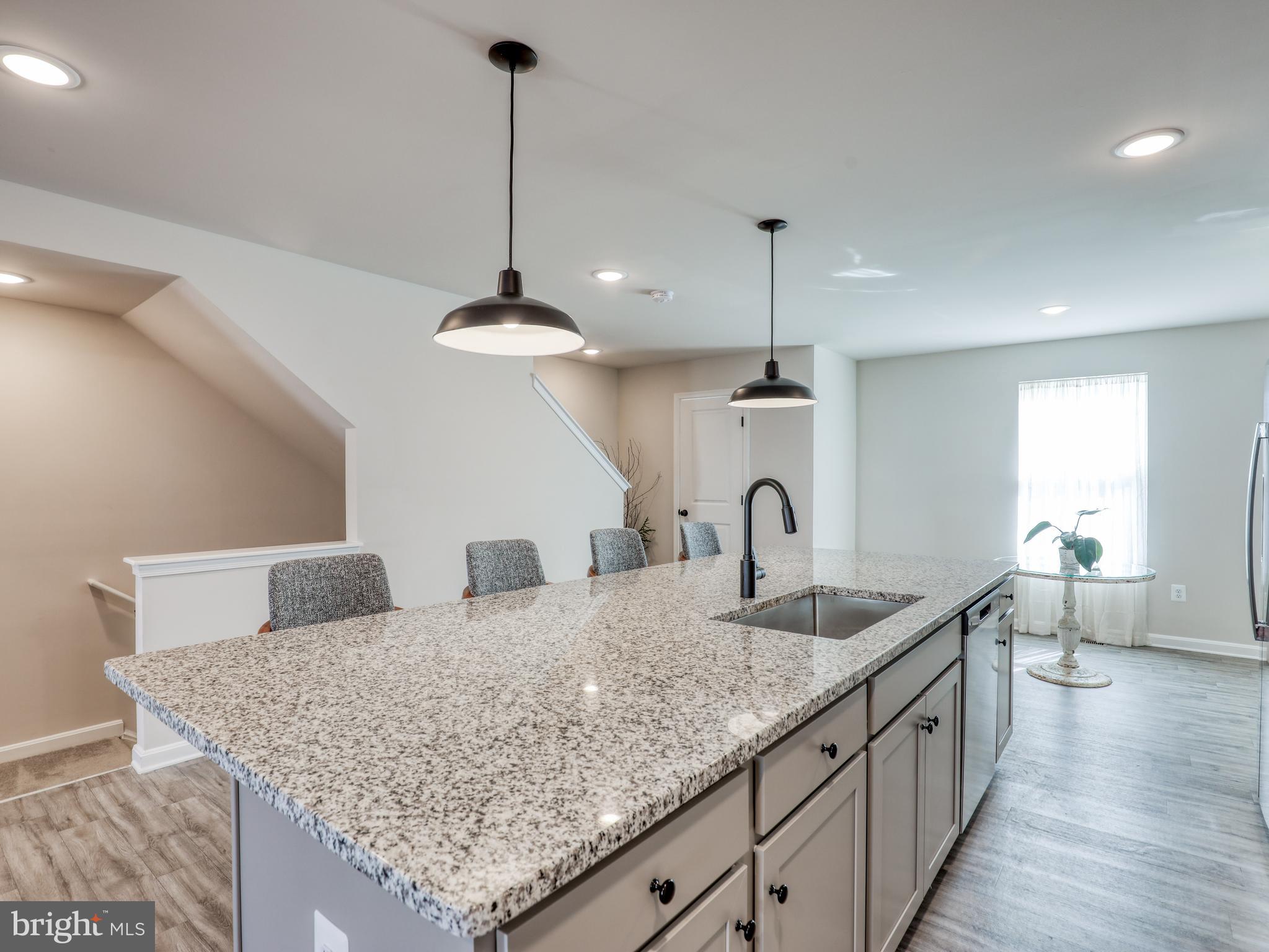 58 Thrower Road Hedgesville, WV 25427 - Photo 23 of 42 a kitchen with center island and living room