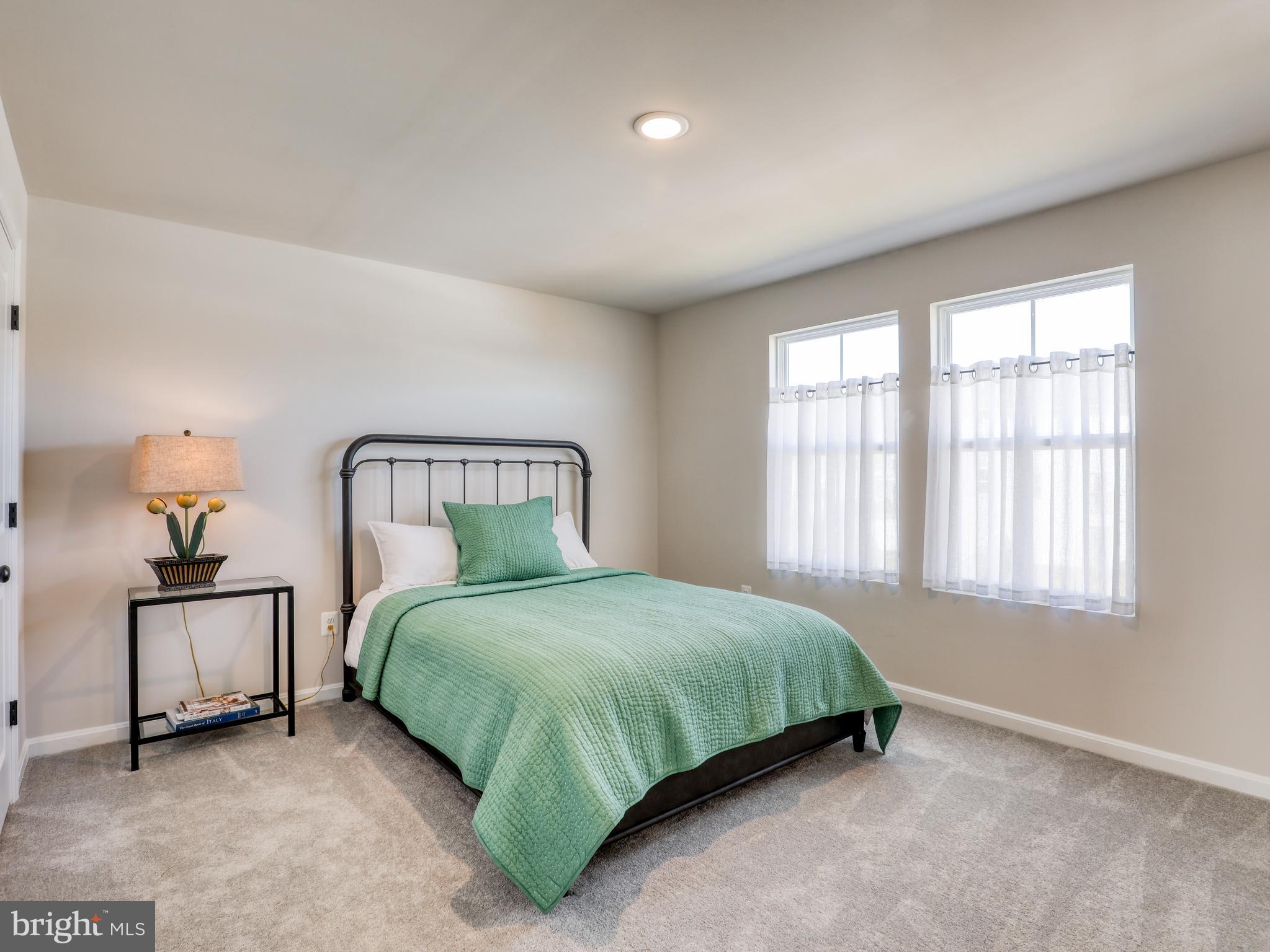 58 Thrower Road Hedgesville, WV 25427 - Photo 26 of 42 a bedroom with a bed and a window