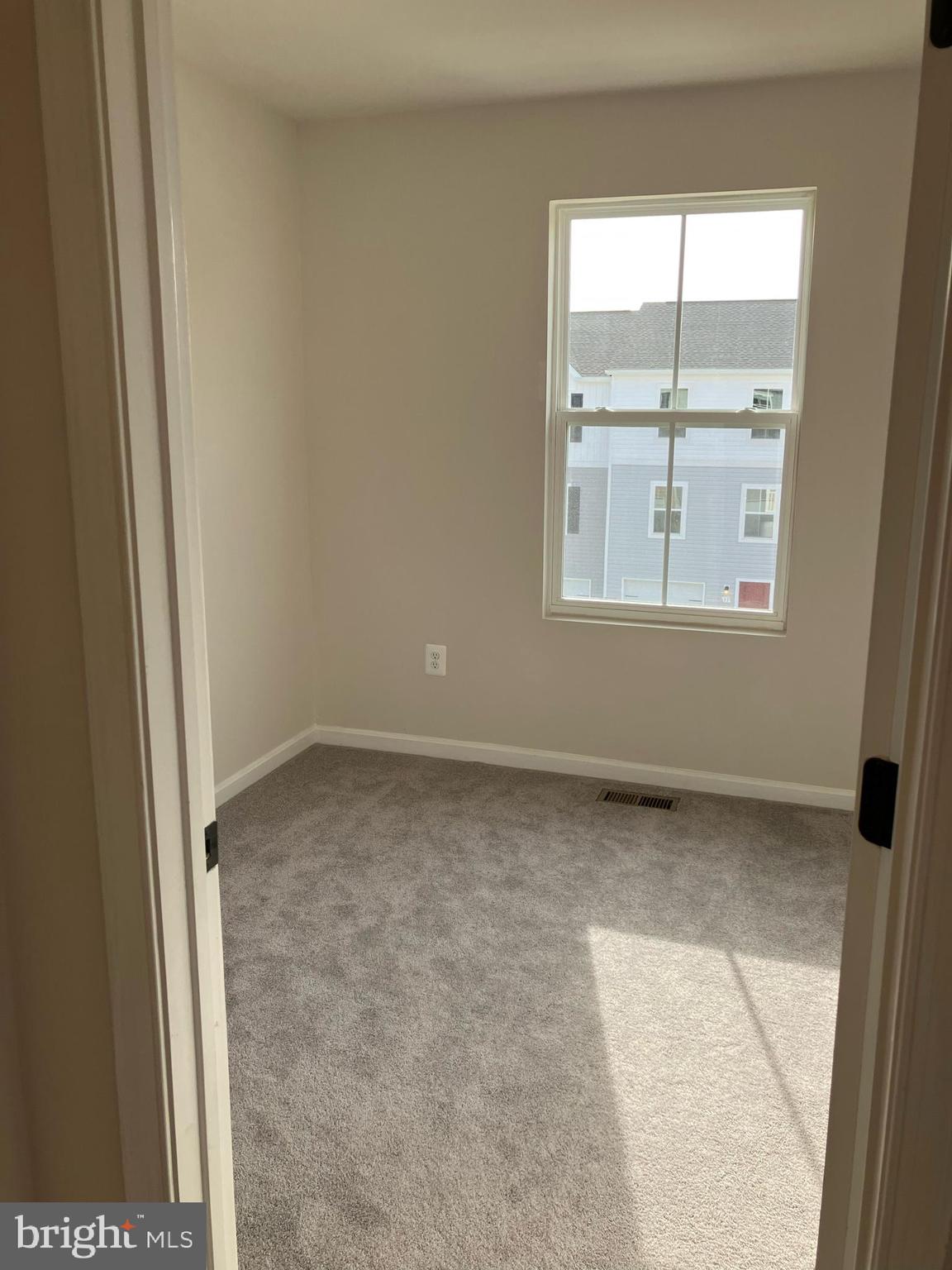 58 Thrower Road Hedgesville, WV 25427 - Photo 35 of 42 an empty room with a window