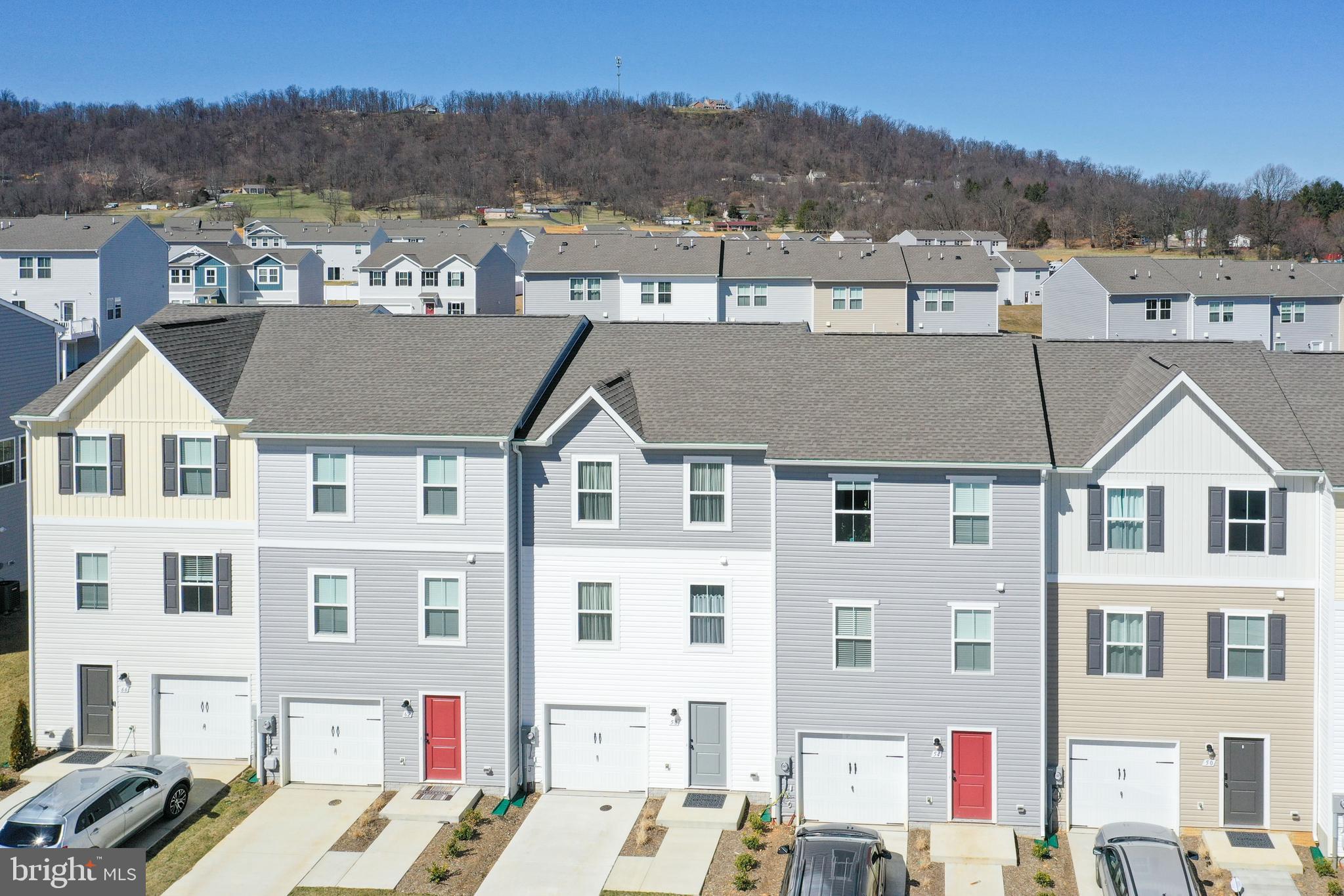 58 Thrower Road Hedgesville, WV 25427 - Photo 37 of 42 an aerial view of residential houses with a city view