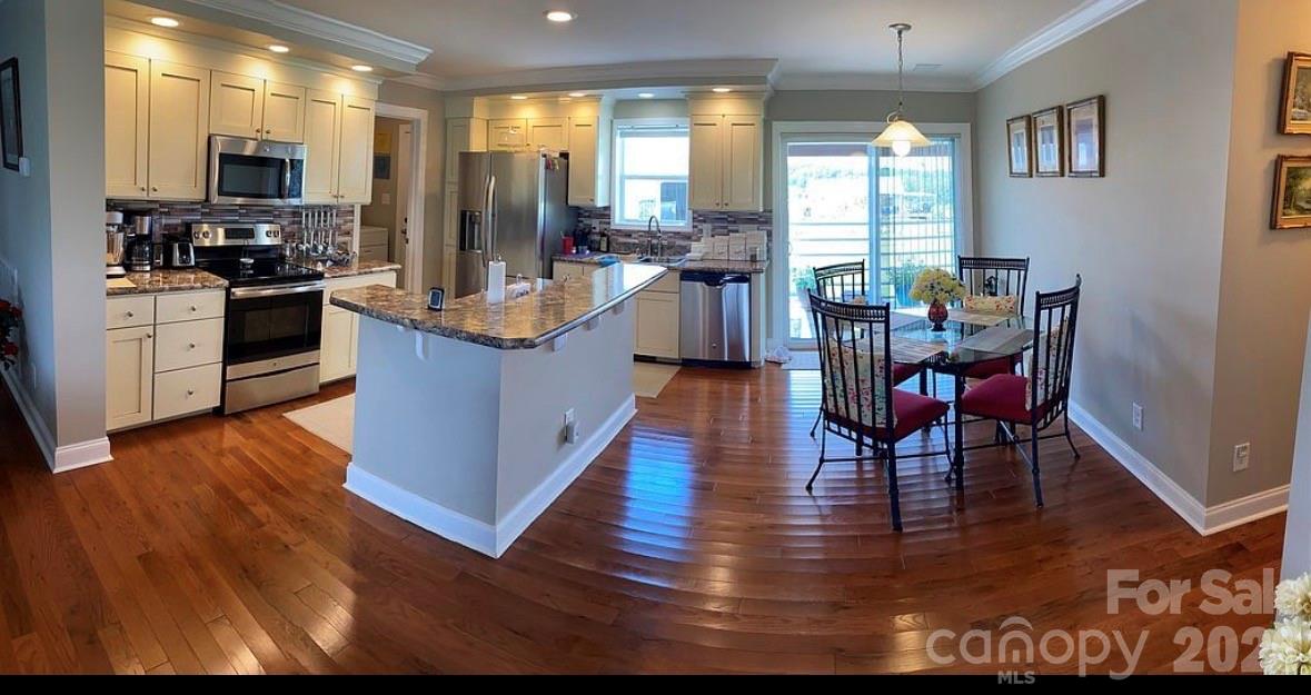 6042 Heavner Road Vale, NC 28168 - Photo 24 of 27 a view of kitchen with sink and dining table