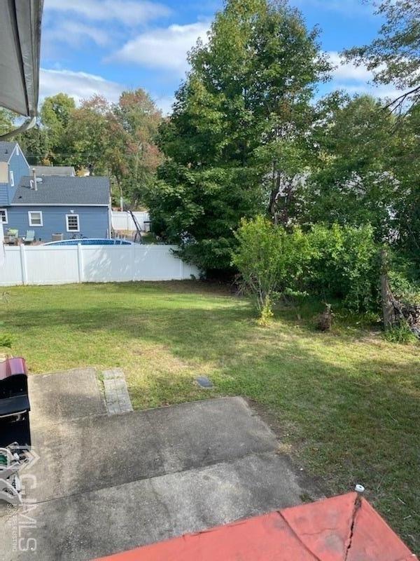 4 Holiday Road Manalapan, NJ 07726 - Photo 8 of 9 a view of a house with a yard