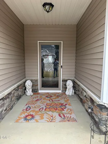 a front view of a house with patio