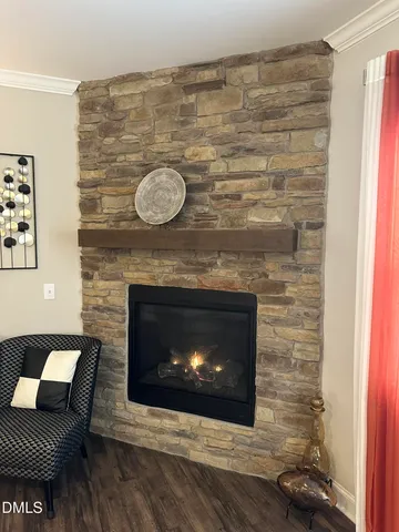 a fireplace with a wooden floor