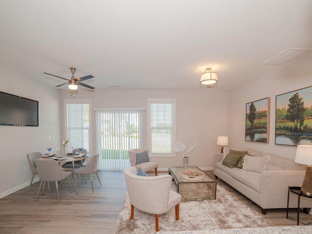 132 Rolesville Ridge Drive Rolesville, NC 27571 - Photo 3 of 9 a living room with furniture and a large window