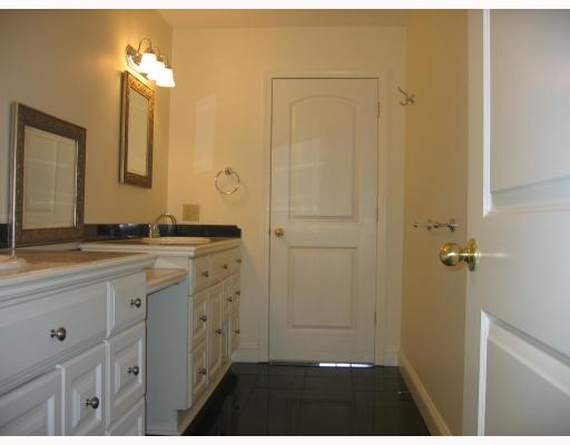 15 Calaman Road Cranston, RI 02910 - Photo 9 of 10 Master Bath/Spa. SECOND FLOOR BATH. DOUBLE SINKS, 2 LINEN CLOSETS (NOT VISIBLE), MARBLE FLOOR, GRANITE COUNTER TOPS.
